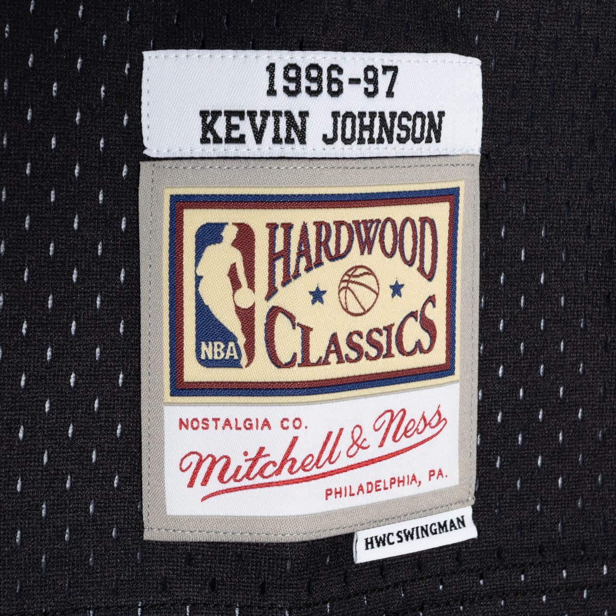 Phoenix Suns mens phoenix suns kevin johnson mitchell  ness purpleblack hardwood classics 199697 split swingman jersey Collection | Official Suns Shop